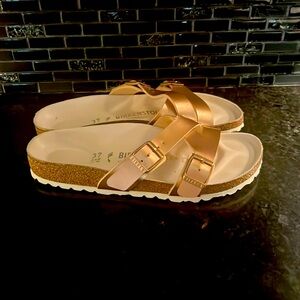 Birkenstock sandals great condition. Only worn twice. Smoke free home.  Size 37